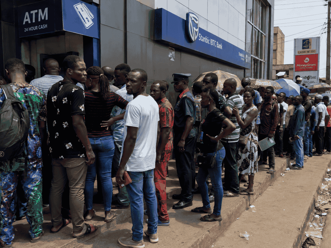 A long queue outside a Stanbic IBTC Bank branch during the 2023 naira cash shortage
